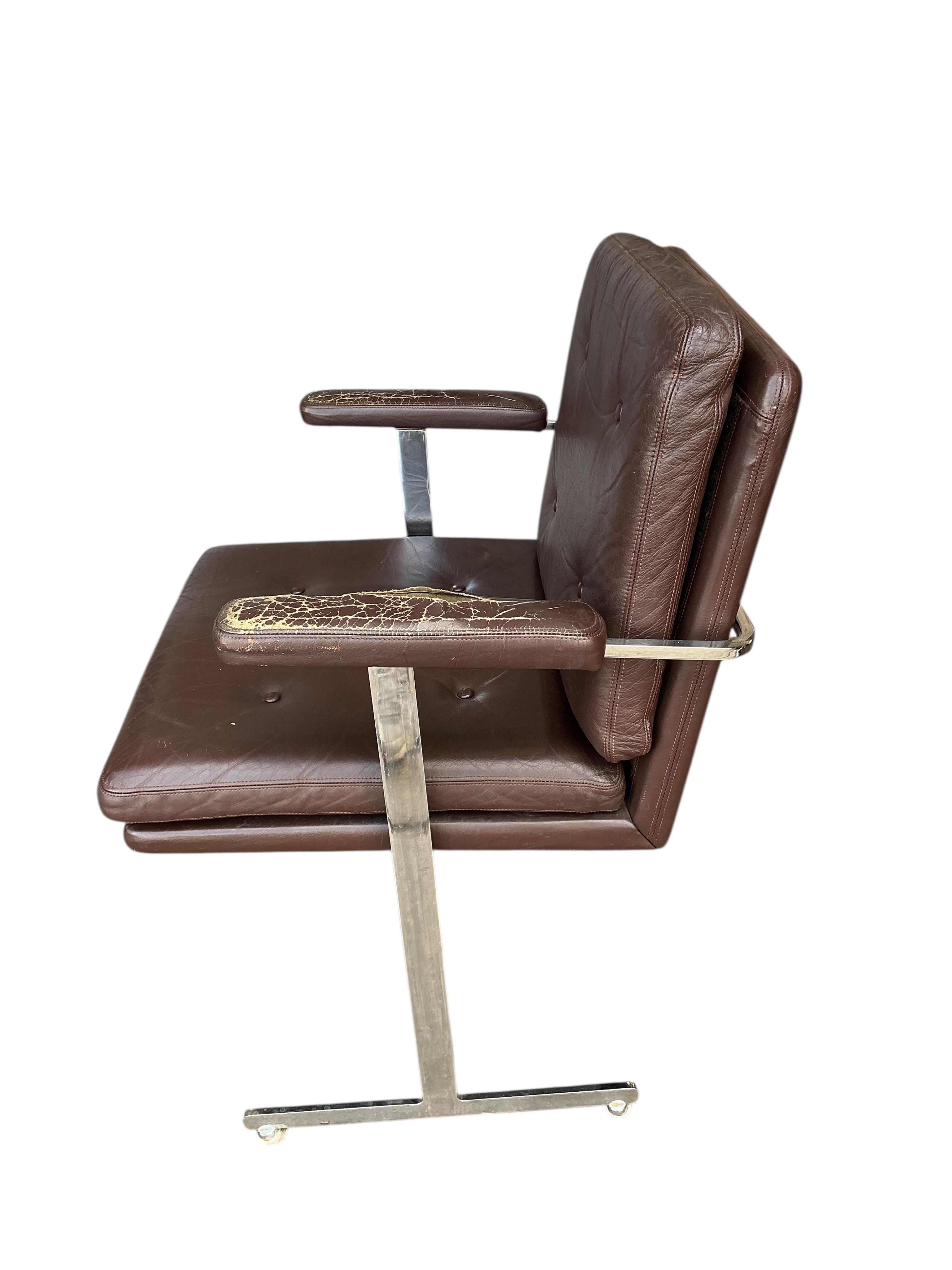 Robin Day for Hille. A pair of Delphi leather and chrome chairs